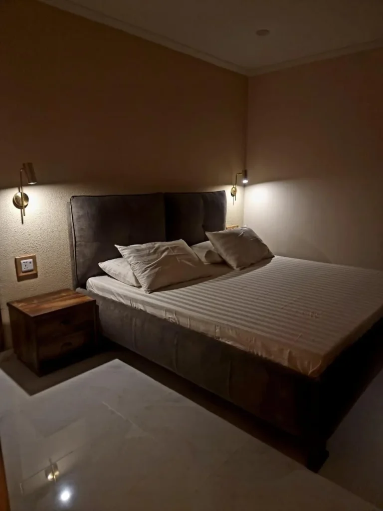 Modern apartment bedroom at Serenity Hilltop Homes, Khaira Gali